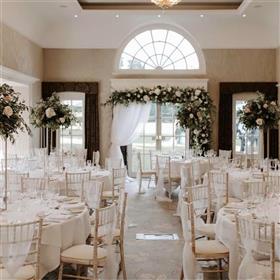 fwthumbMetal stand table centres Royal Berkshire Hotel, half arch.jpg